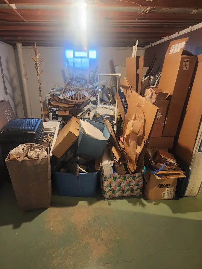 Roll-off dumpster container at job site for Concrete Dumpster Rental in Isanti